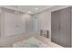 This carpeted bedroom offers a closet and a cabinet for storage at 5269 Silver Branch Ave, Las Vegas, NV 89118