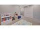 This carpeted bedroom offers a view into the hallway and closet space at 5269 Silver Branch Ave, Las Vegas, NV 89118