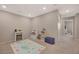 View of the bedroom and its decor, including carpeted floors, recessed lights, and neutral colored walls at 5269 Silver Branch Ave, Las Vegas, NV 89118