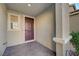 Inviting front porch with a brick floor, covered entryway, and a well-maintained door, offering a charming welcome to visitors at 5269 Silver Branch Ave, Las Vegas, NV 89118