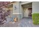 Welcoming entryway featuring a brick walkway, covered porch, and stylish front door, creating a warm first impression at 5269 Silver Branch Ave, Las Vegas, NV 89118
