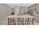 Contemporary kitchen boasting a spacious island, stainless steel appliances, and chic design, perfect for cooking and socializing at 5269 Silver Branch Ave, Las Vegas, NV 89118