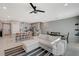 The open-concept living space features a modern kitchen, dining area, and comfortable seating for relaxing and entertaining at 5269 Silver Branch Ave, Las Vegas, NV 89118