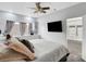 A comfortable bedroom featuring a window sitting area and neutral decor at 534 Rancho Del Mar Way, North Las Vegas, NV 89031