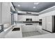 The gorgeous kitchen offers lots of storage space and stainless appliances at 534 Rancho Del Mar Way, North Las Vegas, NV 89031