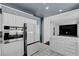 Open kitchen design flows into the living area with a modern aesthetic at 534 Rancho Del Mar Way, North Las Vegas, NV 89031