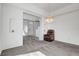 Spacious living room with recessed lights and decorative chandelier at 534 Rancho Del Mar Way, North Las Vegas, NV 89031