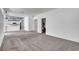 Bright open-concept living room and view to the kitchen at 534 Rancho Del Mar Way, North Las Vegas, NV 89031