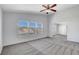 Bright living room with plush carpets and an open layout, perfect for relaxing or entertaining guests at 534 Rancho Del Mar Way, North Las Vegas, NV 89031