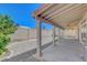 View of the covered patio with ceiling fans in this backyard, a perfect space for outdoor entertaining at 534 Rancho Del Mar Way, North Las Vegas, NV 89031