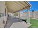 Large covered patio and manicured backyard at 534 Rancho Del Mar Way, North Las Vegas, NV 89031