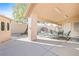 Spacious covered patio with comfortable seating, ideal for outdoor entertaining and relaxation at 5405 Lucky Clover St, Las Vegas, NV 89149