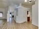 Spacious open-concept living room with hardwood floors leading to kitchen at 5405 Lucky Clover St, Las Vegas, NV 89149