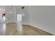 View of the living room, highlighting modern wood floors and an open layout at 5405 Lucky Clover St, Las Vegas, NV 89149