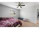 Well-lit bedroom with ceiling fan and large window offers a peaceful retreat at 5631 Hill Cliff Ct, North Las Vegas, NV 89031