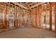 The unfinished bedroom 2 is framed with wood, and has pre-installed ventilation with unfinished concrete floors at 5855 St Ebbes Ct, Las Vegas, NV 89131