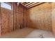 Unfinished bedroom with exposed wood framing, ductwork, and concrete flooring at 5855 St Ebbes Ct, Las Vegas, NV 89131