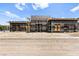 Exterior shot of the home's modern design, with scaffolding in place during the construction phase at 5855 St Ebbes Ct, Las Vegas, NV 89131