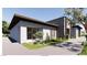 Contemporary home showcasing clean lines, modern architecture, and drought-tolerant landscaping at 5855 St Ebbes Ct, Las Vegas, NV 89131