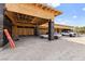 Spacious garage area under construction, with wooden beams and exterior framework visible at 5855 St Ebbes Ct, Las Vegas, NV 89131