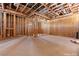 Spacious unfinished home gym featuring exposed framing, ductwork, and concrete flooring at 5855 St Ebbes Ct, Las Vegas, NV 89131