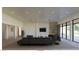 Bright living room with modern decor, comfortable seating, and large windows showcasing an inviting atmosphere at 5855 St Ebbes Ct, Las Vegas, NV 89131