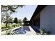 Lush backyard featuring a modern pool, landscaped gardens, and an inviting outdoor space at 5855 St Ebbes Ct, Las Vegas, NV 89131