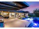 Entertainer's dream backyard features a pool, spa, outdoor kitchen, and a seamless indoor-outdoor flow at 6194 Stone Rise St, Las Vegas, NV 89135