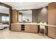 Large bathroom with double vanity, makeup area, and floor to ceiling mirror at 6194 Stone Rise St, Las Vegas, NV 89135