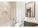 Bathroom featuring a modern tub, shower, vanity, and white tile at 6194 Stone Rise St, Las Vegas, NV 89135