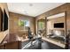 Home gym featuring workout equipment, large mirrors, and ample lighting at 6194 Stone Rise St, Las Vegas, NV 89135