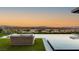 Luxury infinity pool with seating area overlooking city views and a serene outdoor setting at 6194 Stone Rise St, Las Vegas, NV 89135