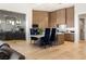 Beautiful kitchen featuring stainless steel appliances, dining table and hardwood floors at 6194 Stone Rise St, Las Vegas, NV 89135