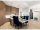 Eat-in kitchen showcasing modern cabinets, stainless steel appliances, and marble countertops at 6194 Stone Rise St, Las Vegas, NV 89135
