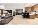 Open floor plan with kitchen, dining area, and living room featuring expansive views at 6194 Stone Rise St, Las Vegas, NV 89135