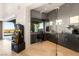 Modern home office with gray cabinets, natural light and partial city view at 6194 Stone Rise St, Las Vegas, NV 89135