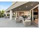 Inviting outdoor living space showcasing modern furniture and seamless indoor-outdoor flow at 6194 Stone Rise St, Las Vegas, NV 89135