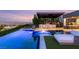 Luxury home featuring an in-ground pool, integrated spa, outdoor kitchen, and city views at 6194 Stone Rise St, Las Vegas, NV 89135