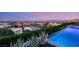 Gorgeous pool with a spa, drought tolerant landscaping, and scenic city views at 6194 Stone Rise St, Las Vegas, NV 89135