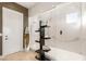 Modern walk-in shower featuring marble tile, glass doors and custom shelving at 6194 Stone Rise St, Las Vegas, NV 89135