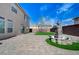 Backyard features a quaint water fountain, brick pavers and privacy wall at 6205 Windy Oaks Ct, Las Vegas, NV 89139