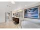 Bright bathroom featuring double vanity, artwork, soaking tub and tile flooring at 6205 Windy Oaks Ct, Las Vegas, NV 89139