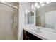 Clean bathroom featuring a walk-in shower, bright vanity, and spacious layout at 6205 Windy Oaks Ct, Las Vegas, NV 89139