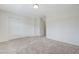 Spacious bedroom features neutral carpet and paint, and a double door closet at 6205 Windy Oaks Ct, Las Vegas, NV 89139