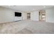 Huge upstairs bonus room with neutral carpet, bright natural light, and versatile living space at 6205 Windy Oaks Ct, Las Vegas, NV 89139