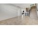 Spacious entryway features tile floors, staircase, and ample natural light at 6205 Windy Oaks Ct, Las Vegas, NV 89139