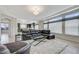 The living room boasts lots of light and space with access to the kitchen at 6205 Windy Oaks Ct, Las Vegas, NV 89139