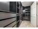 Spacious walk-in closet with custom shelving, drawers, and ample storage solutions at 6205 Windy Oaks Ct, Las Vegas, NV 89139