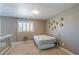 Bright bedroom with neutral walls, window shutters, and comfortable bed and decor at 6251 Tuckaway Cove Ave, Las Vegas, NV 89139