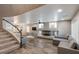 Spacious living room with fireplace, ceiling fan and tile floors at 6251 Tuckaway Cove Ave, Las Vegas, NV 89139